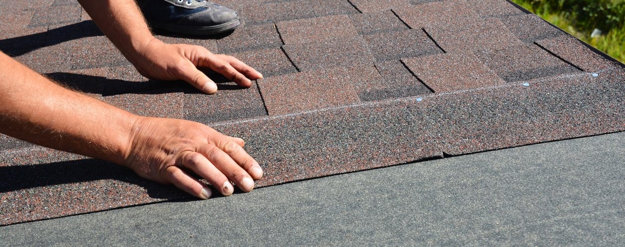 installing asphalt shingles on a roof