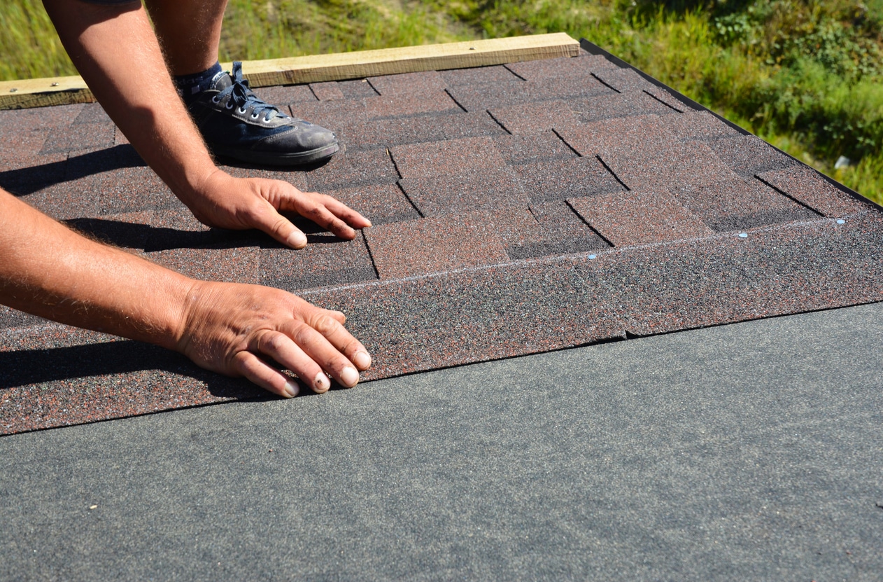 installing asphalt shingles on a roof