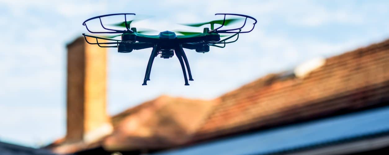 Drone roof inspection in Kennesaw, GA, capturing aerial views of a residential rooftop for damage assessment.