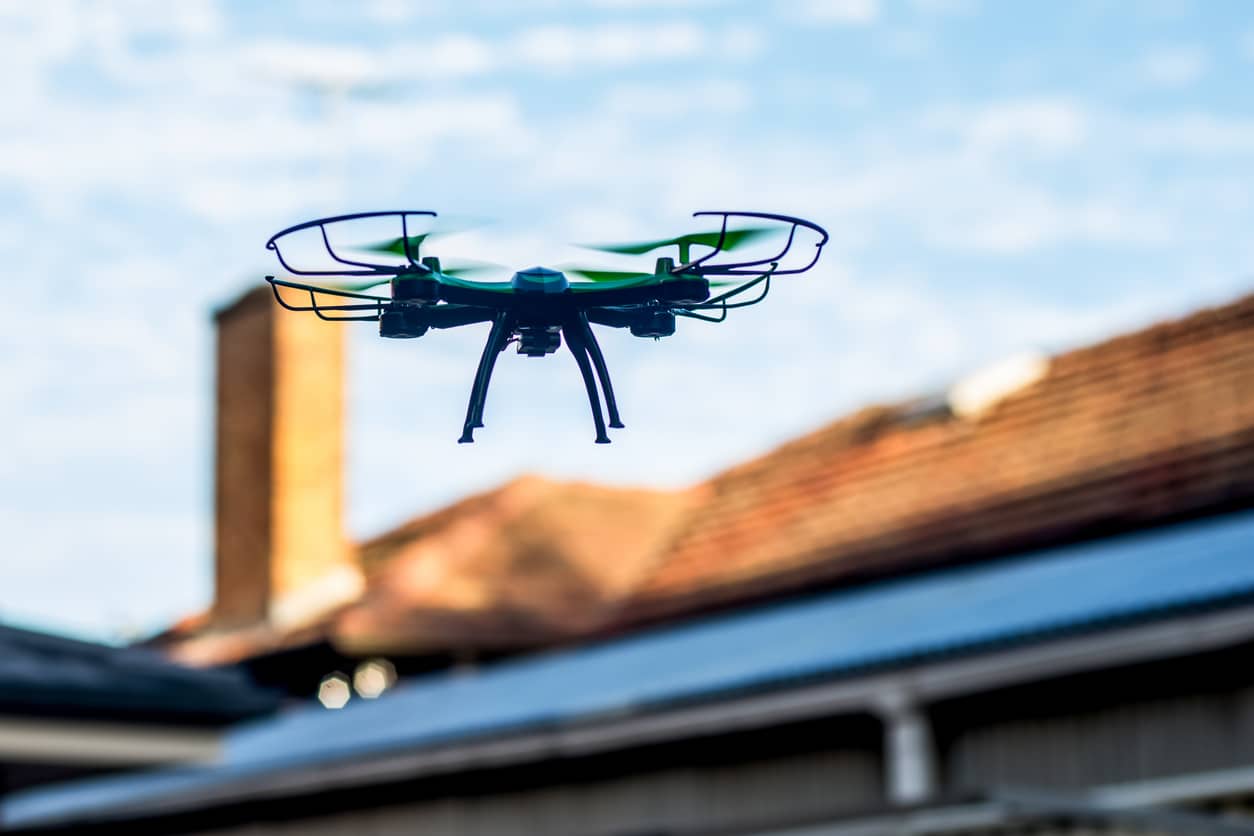 Drone roof inspection in Kennesaw, GA, capturing aerial views of a residential rooftop for damage assessment.